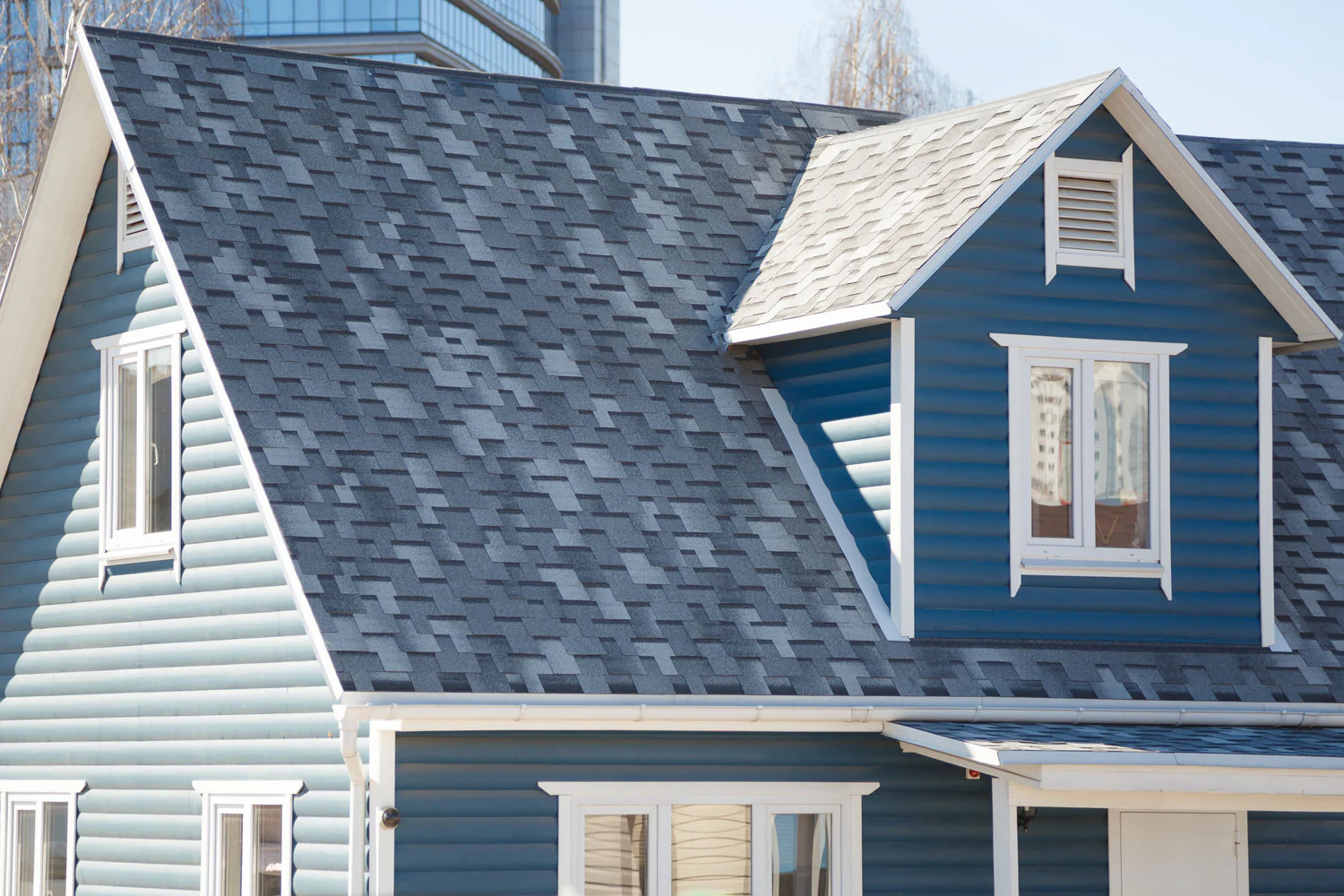 new-blue-home-with-gray-shingled-roof-2026-03-19-03-20-09-utc